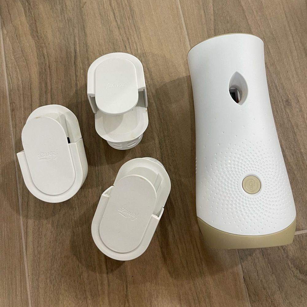 Febreze Plug-In Air Freshener & Glade Automatic Spray Air Freshener Bundle